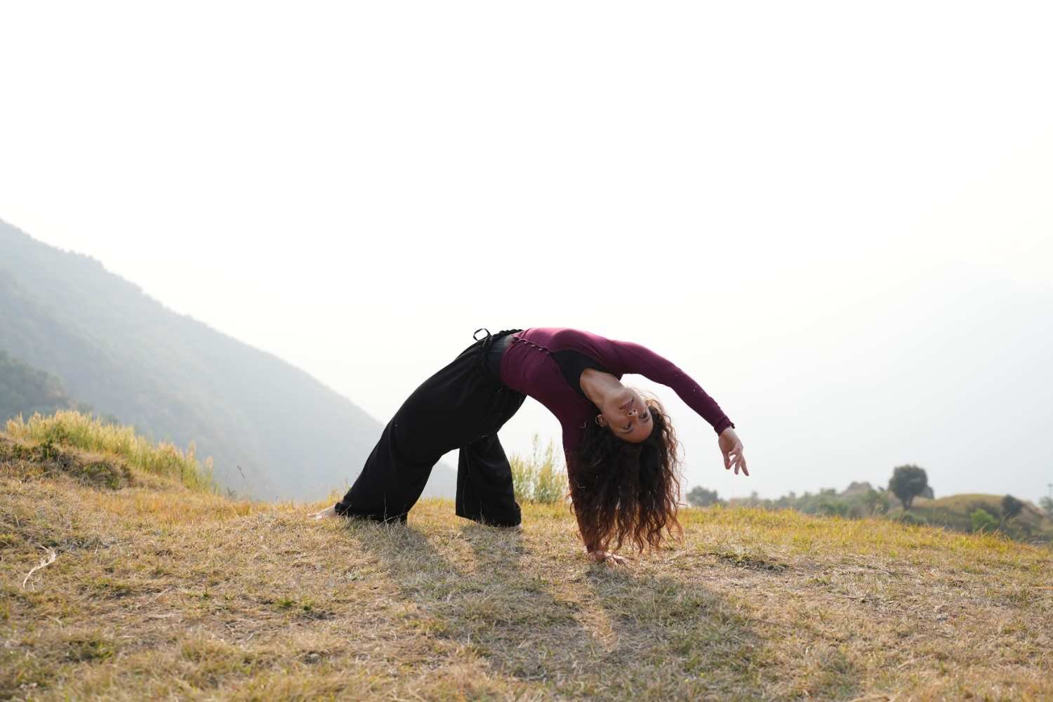Students practicing traditional yoga during training in Rishikesh